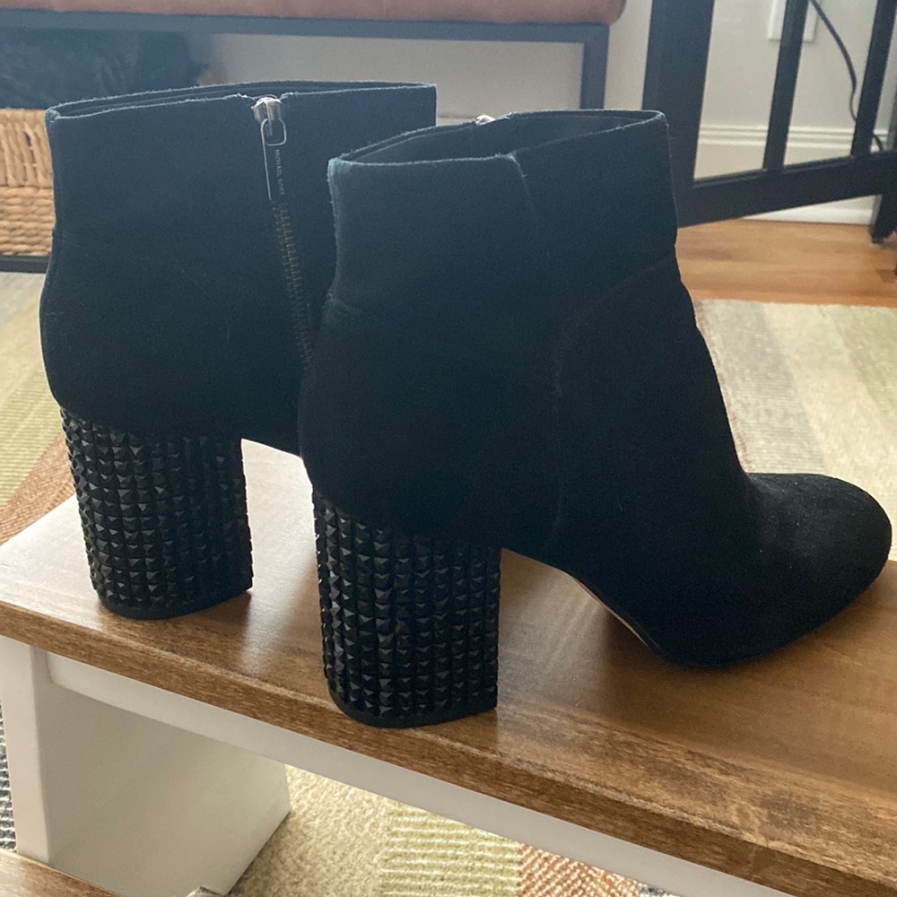 Black suede booties with unique jewel-cut block heel